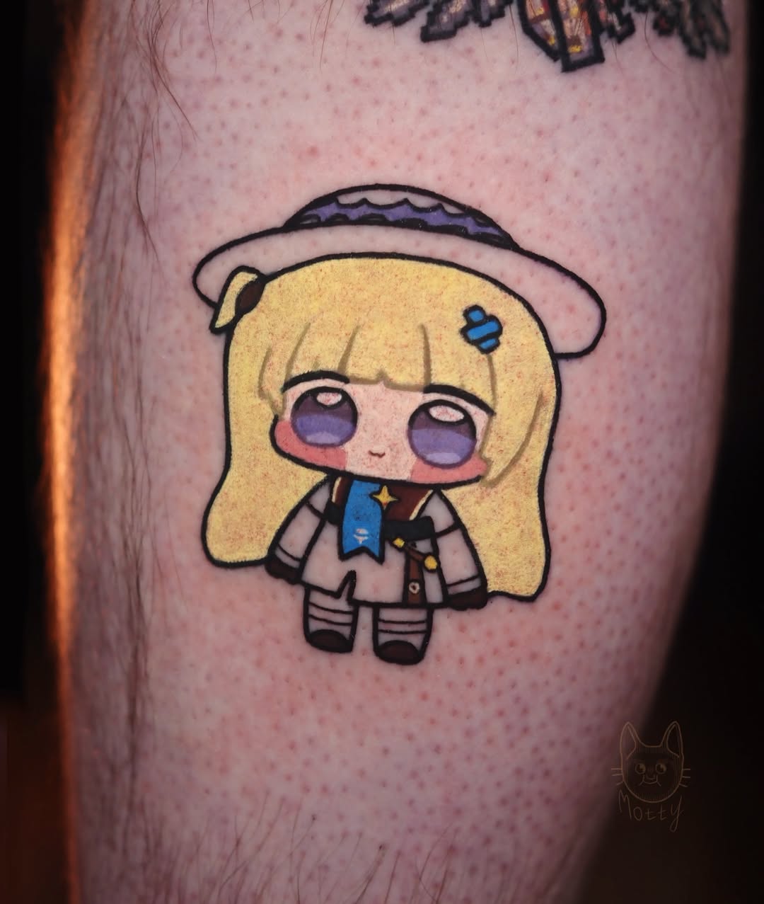 motty_tattoo